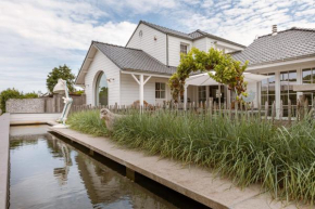 Beautiful and spacious house with swimming pond sauna and garden